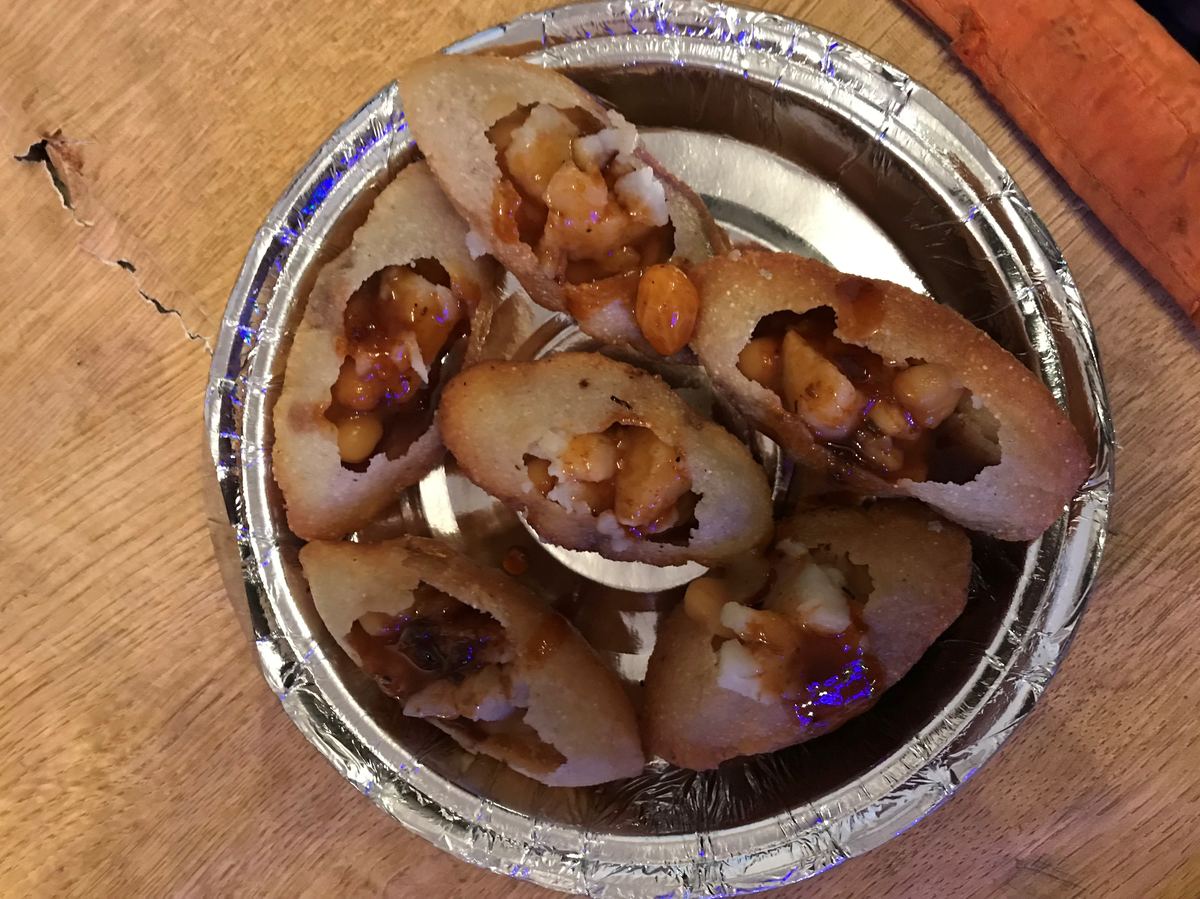 Fuchka served with tamarind water